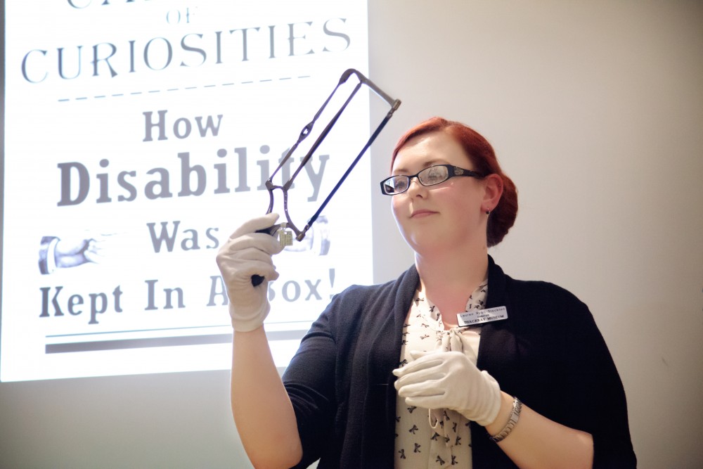 Lauren displays a surgical saw at the Cabinet of Curiosities event (Thackray Medical Museum, Leeds).
